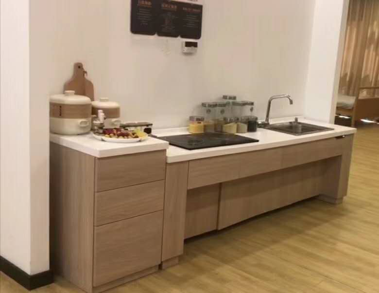 Lifting cabinet table-